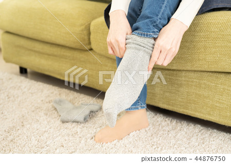 Woman wearing thick socks Woman wearing thick socks 44876750