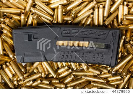 Ammunition and magazine background. Ammo, weapon concept. Ammunition and magazine background. Ammo, weapon concept. 44879960