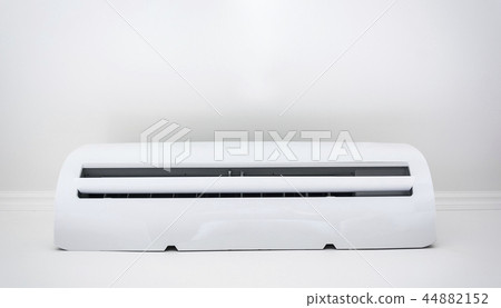 white air conditioner mounted on a white wall 44882152