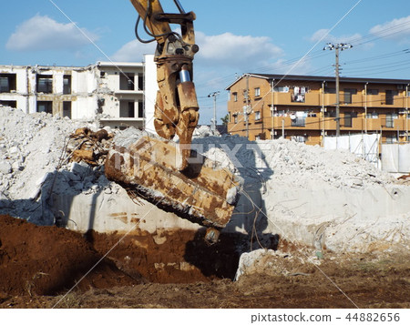 Removal of the most difficult foundation and underground beams in building dismantling Removal of the most difficult foundation and underground beams in building dismantling 44882656
