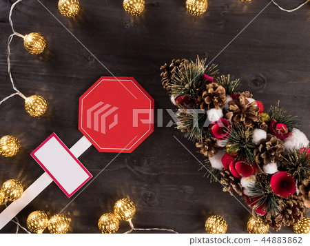 Christmas light on wooden background with home decorations 44883862