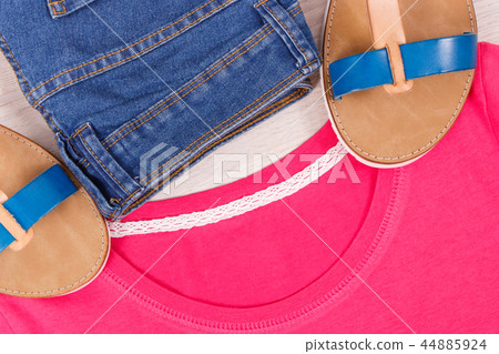 Womanly sandals, trousers and shirt or sweater 44885924