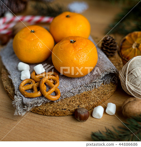 Christmas still life with tangerines and fir tree 44886686