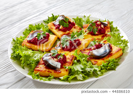 Polenta Squares with Creamy beetroot puree 44886810