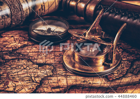 Old vintage compass on ancient map Old vintage compass on ancient map 44888460