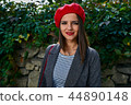 Red beret and smile. 44890148