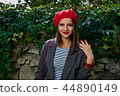 Girl showing nails. 44890149