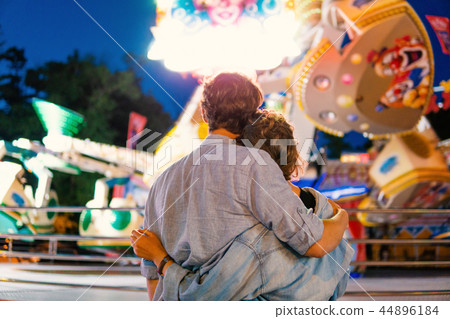 Lovely young hipster couple dating during summer sunset. Lovely young hipster couple dating during summer sunset. 44896184