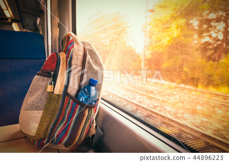 Backpack on the train . Travel conceptual image. Backpack on the train . Travel conceptual image. 44896223