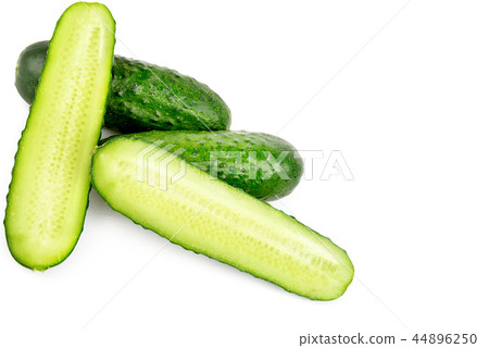 Ripe green cucumbers isolated on white background. Ripe green cucumbers isolated on white background. 44896250