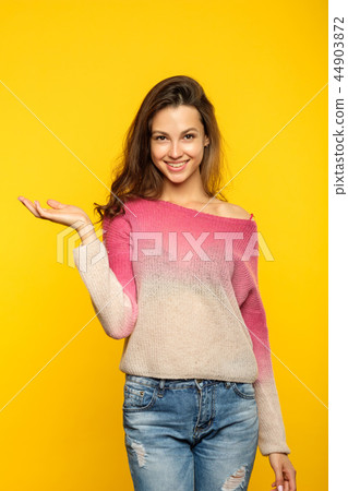woman standing holding advertising object hand 44903872