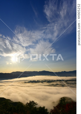 Chichibu mountain range and morning sun clouds over morning mist cloud sea Chichibu mountain range and morning sun clouds over morning mist cloud sea 44905252
