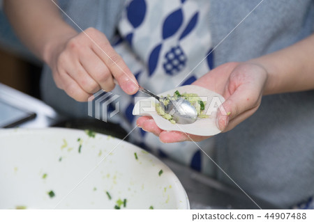 Hand making dumplings Hand making dumplings 44907488