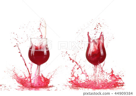 Glass with red wine splash 44909384