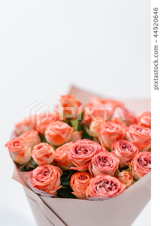 Roses peach and orange pastel colors. Bright bouquet in metal bucket. concept of flower shop. Roses peach and orange pastel colors. Bright bouquet in metal bucket. concept of flower shop. 44920646