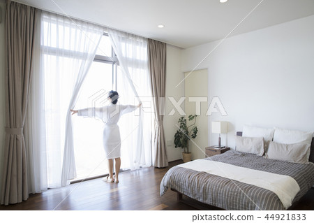 Woman in bathrobe 44921833