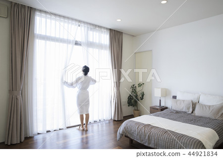 Woman in bathrobe 44921834