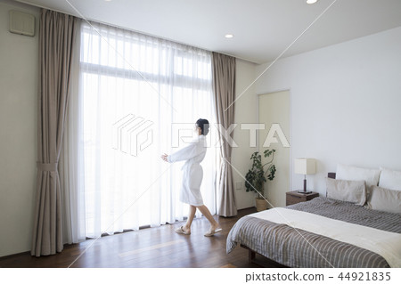 Woman in bathrobe 44921835