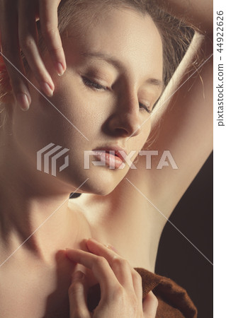 young sensual topless woman with closed eyes 44922626