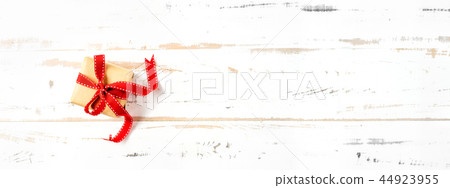 Top view of present for Christmas on wooden background 44923955