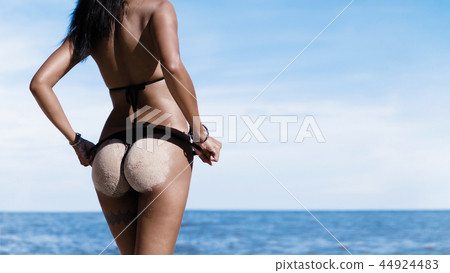 sexy girl with nice shape and tan skin at beach. sexy girl with nice shape and tan skin at beach. 44924483