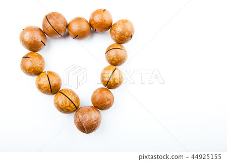 Macadamia nut heart symbol white background  44925155