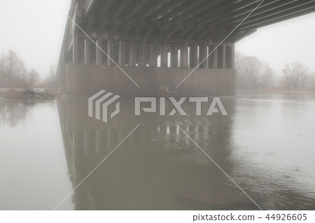 Spring mist under the bridge 44926605