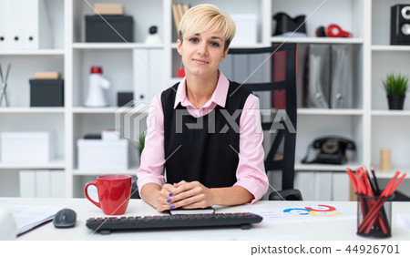 Portrait of a beautiful young girl in the office. Portrait of a beautiful young girl in the office. 44926701
