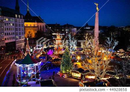 Christmas market. Winter fair with tree and lights Christmas market. Winter fair with tree and lights 44928658