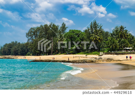 View of blue sea and stones and beach at sunset 44929618