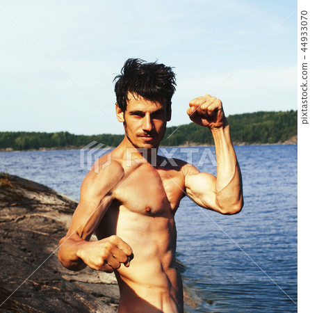 handsome young man at beach 44933070