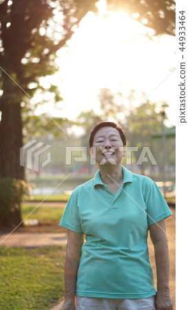 asian senior woman smile in sunshine nature asian senior woman smile in sunshine nature 44933464