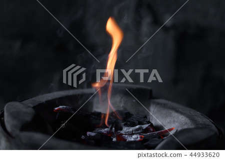 The flames are burning in the furnace. The flames are burning in the furnace. 44933620