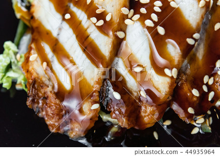 Salad With Smoked Eel with Unagi Sauce. Japanese Food Salad With Smoked Eel with Unagi Sauce. Japanese Food 44935964