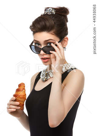 beautiful young woman in retro style with croissant beautiful young woman in retro style with croissant 44938068