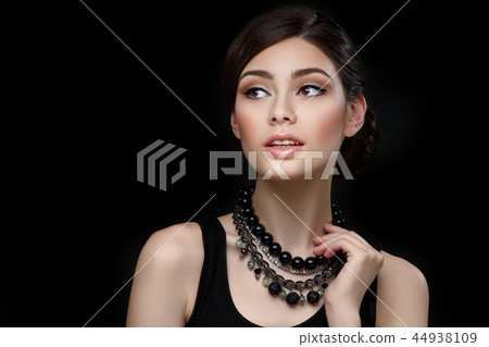 beautiful girl with hairdo on balck background beautiful girl with hairdo on balck background 44938109