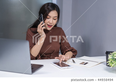 woman using smartphone and digital tablet to online shopping woman using smartphone and digital tablet to online shopping 44938494