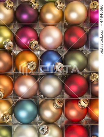 Christmas balls in different colors Christmas balls in different colors 44940666