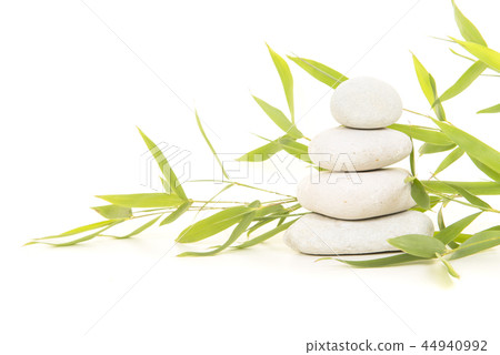 Pile of white stones with bamboo 44940992