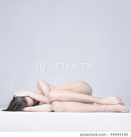 Elegant sitting lady 44944199