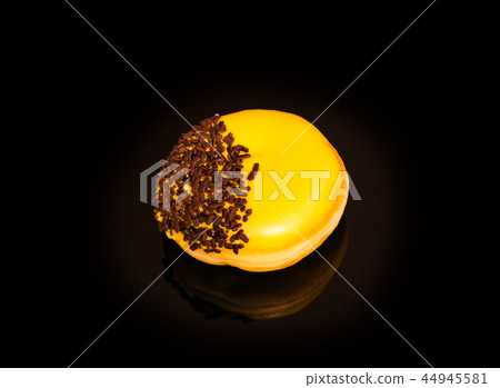 Lemon donut covered by chocolate 44945581