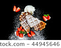 Belgian waffles with sugar icing and strawberries 44945646
