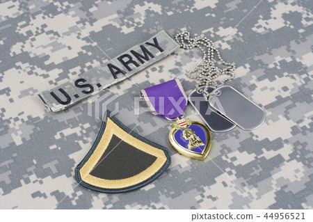 Purple Heart award with dog tags on uniform Purple Heart award with dog tags on uniform 44956521