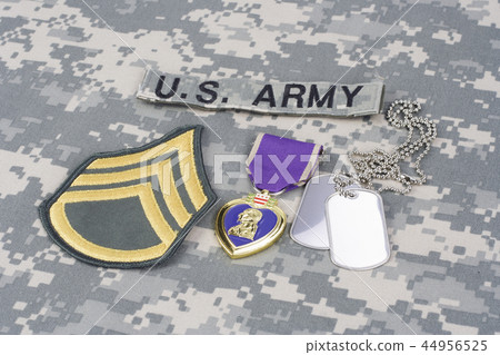 Purple Heart award with dog tags on uniform 44956525