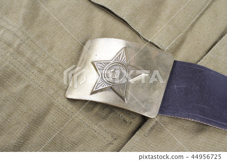 vintage buckle on USSR Soviet Army khaki uniform background 44956725
