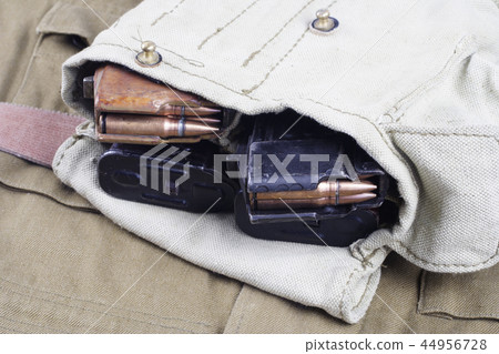 AK47 on USSR Soviet Army khaki uniform background 44956728