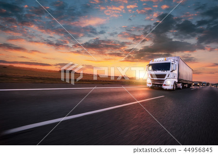 Truck with container on road, cargo transportation concept. Truck with container on road, cargo transportation concept. 44956845