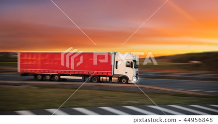 Truck with container on road, cargo transportation concept. Truck with container on road, cargo transportation concept. 44956848