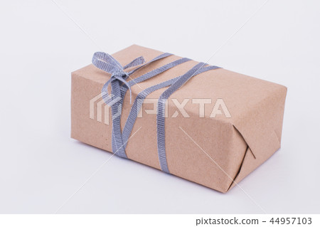 Brown gift box isolated on gray background. Brown gift box isolated on gray background. 44957103