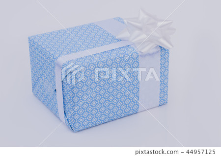 Blue gift box with white satin ribbon. 44957125